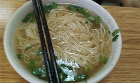 ţ